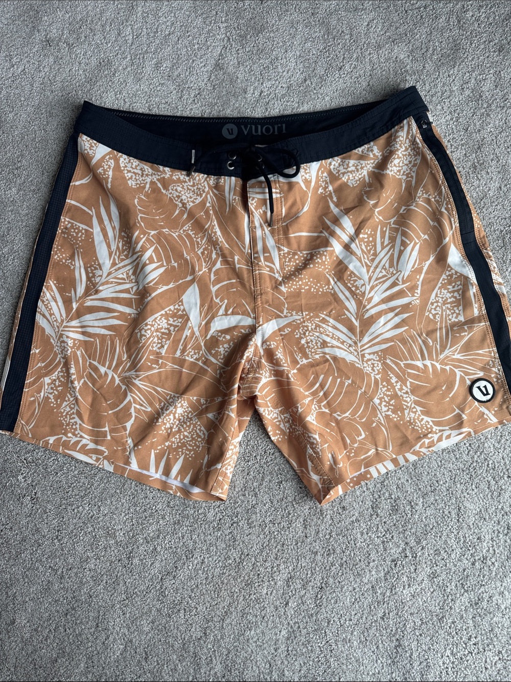 Vuori Men’s Tan Floral-Print Board Shorts with Black Waistband